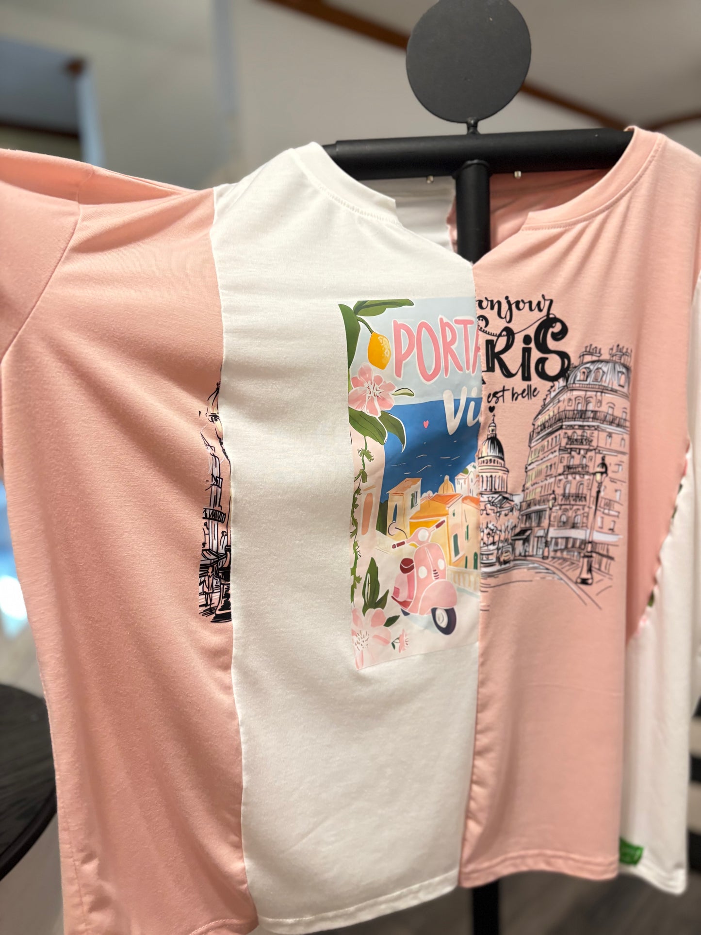 Trendy colorblock t-shirt featuring Paris-themed graphic and vibrant prints, perfect for casual wear. Sleeve