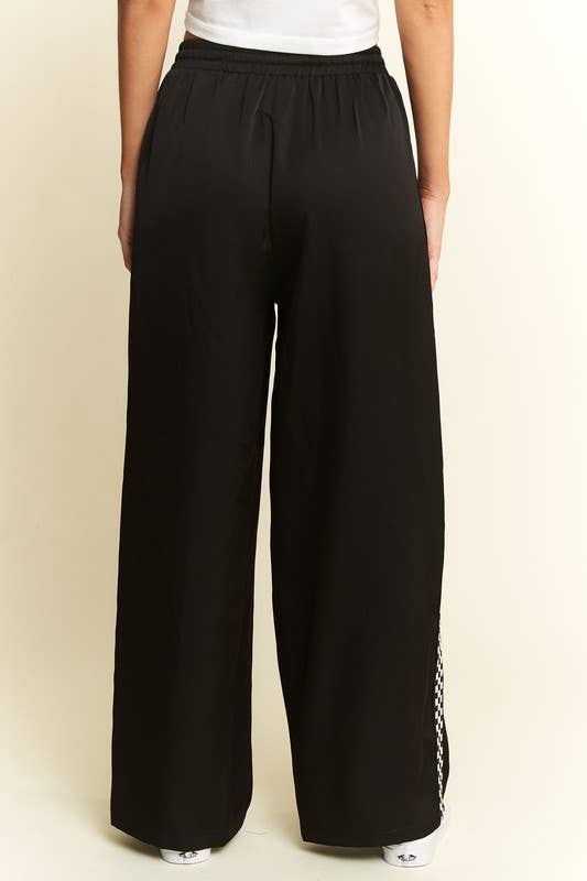 SOLID SATIN SWEATPANTS WITH SIDE CHECKERBOARD TAPE: Black