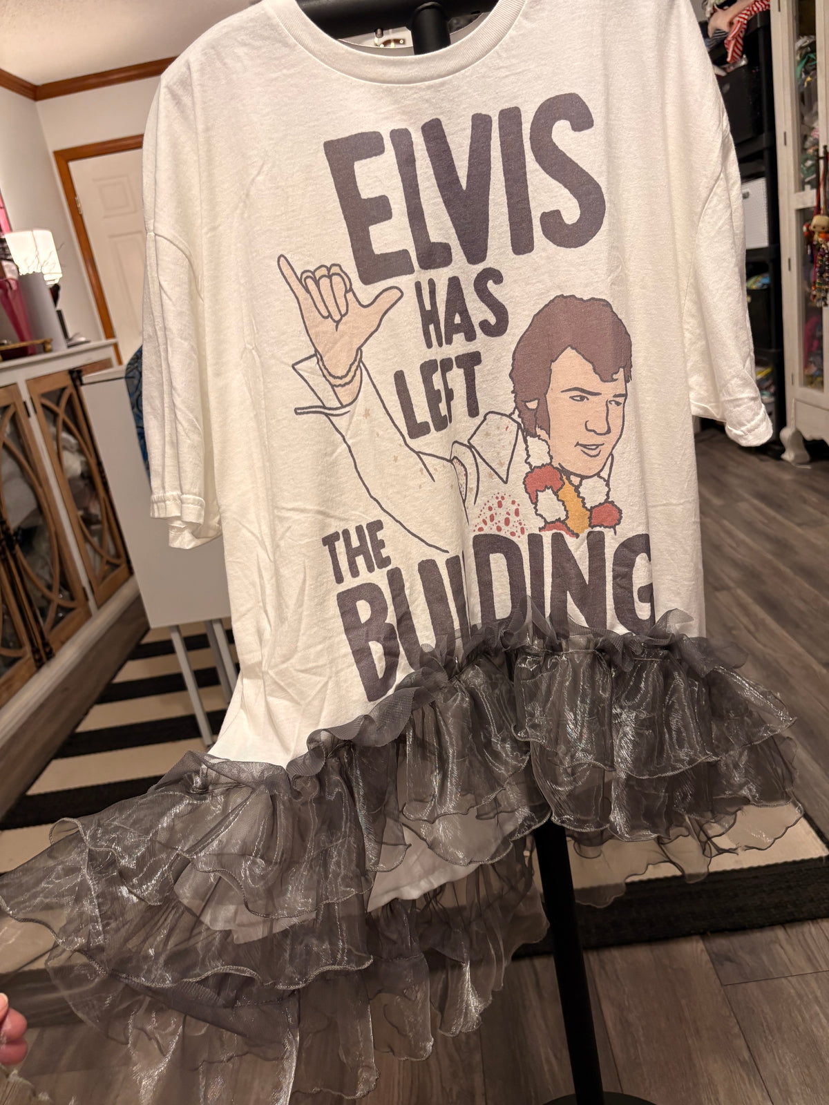 He’s Left The Building Hi/Lo Glam Tee One Size Fits a Small to XXL
