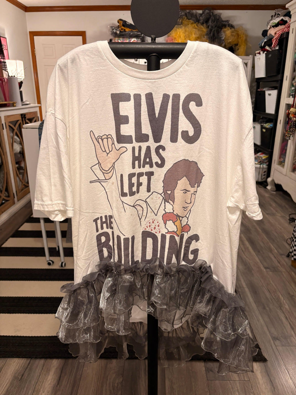 He’s Left The Building Hi/Lo Glam Tee One Size Fits a Small to XXL