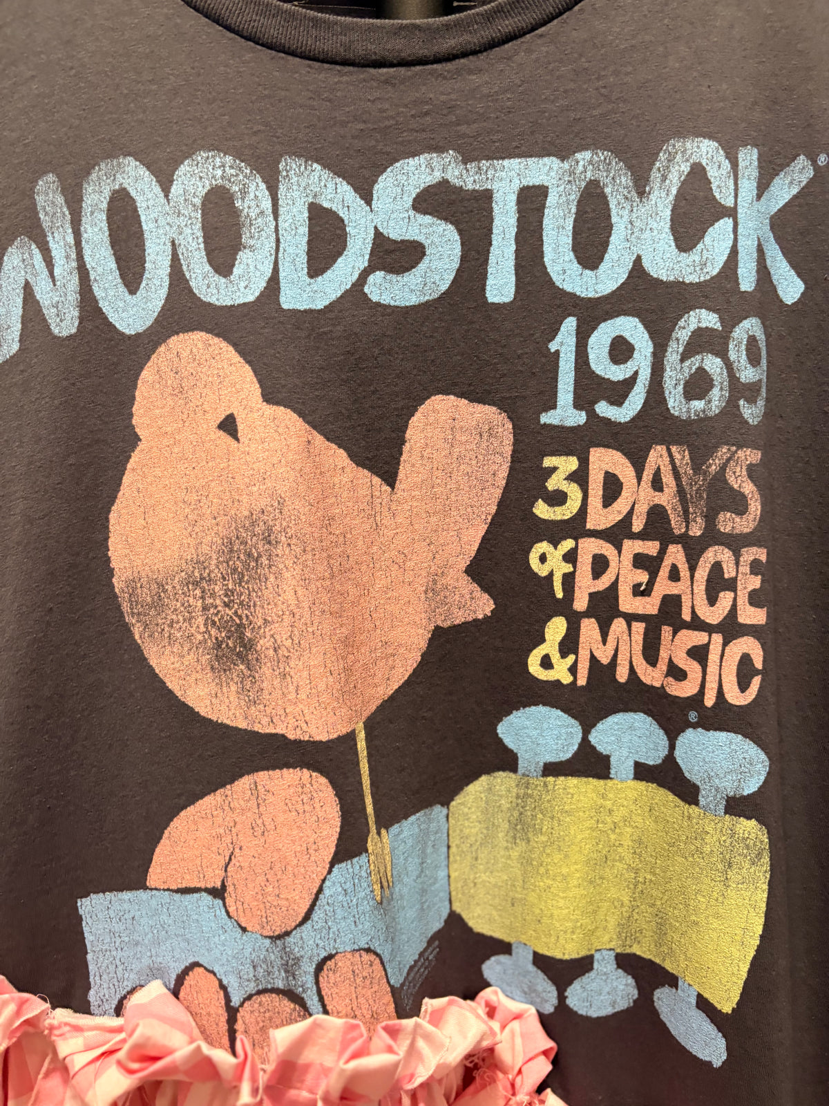 Woodstock Checker Fringe Asymmetrical Tee One Size Fits Small to 3X