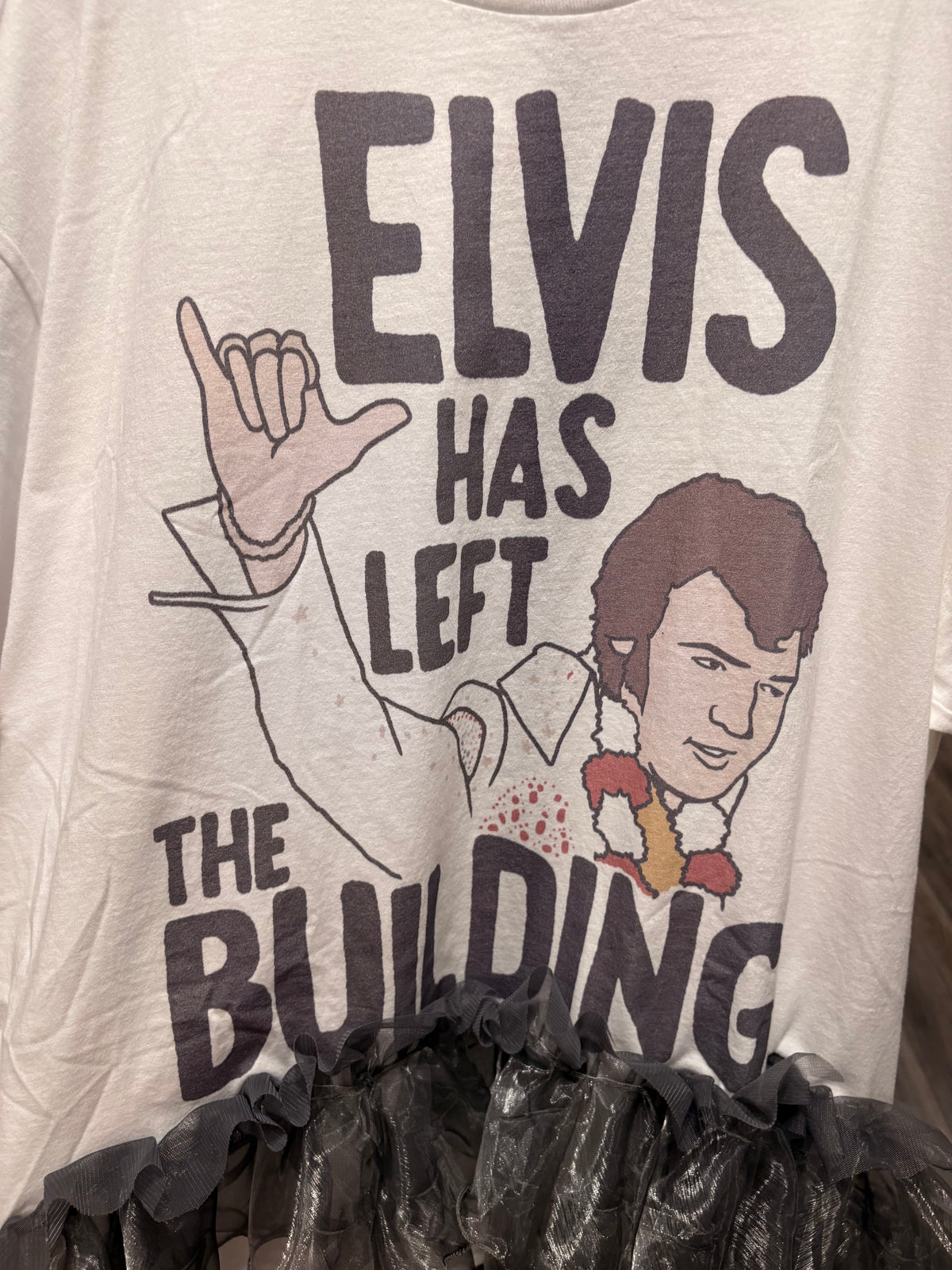 He’s Left The Building Hi/Lo Glam Tee One Size Fits a Small to XXL