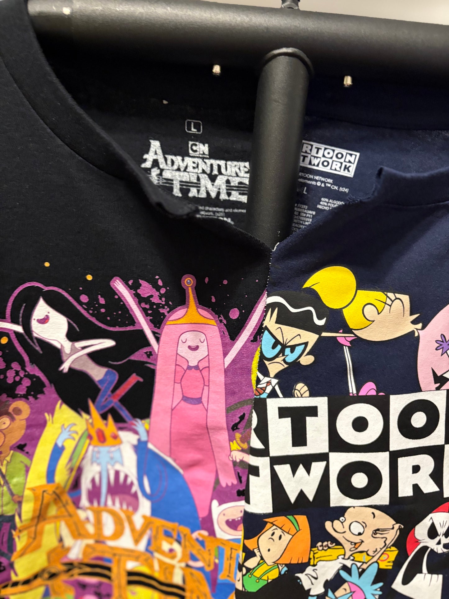 Graphic oversized tee featuring popular cartoon characters and a vibrant "Toon Work" design. Perfect for casual wear! Detail
