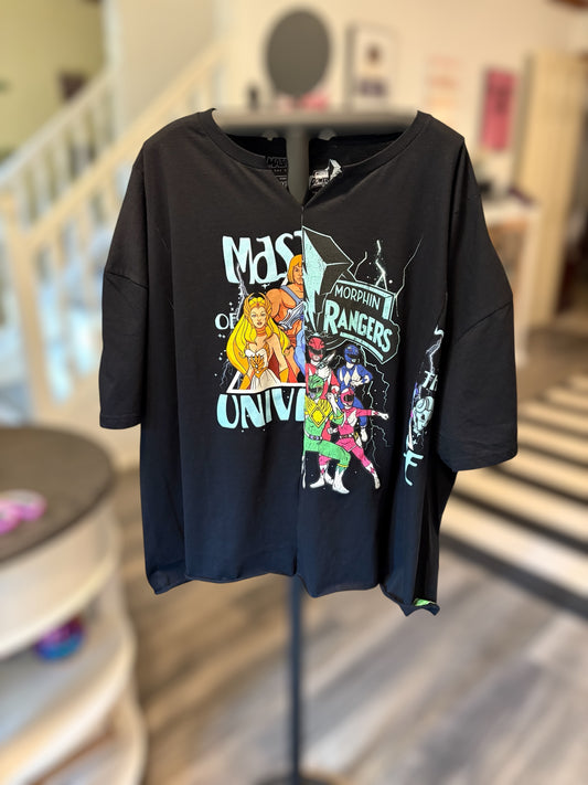 Black graphic tee featuring He-Man and Power Rangers, perfect for nostalgia lovers and pop culture fans. Front
